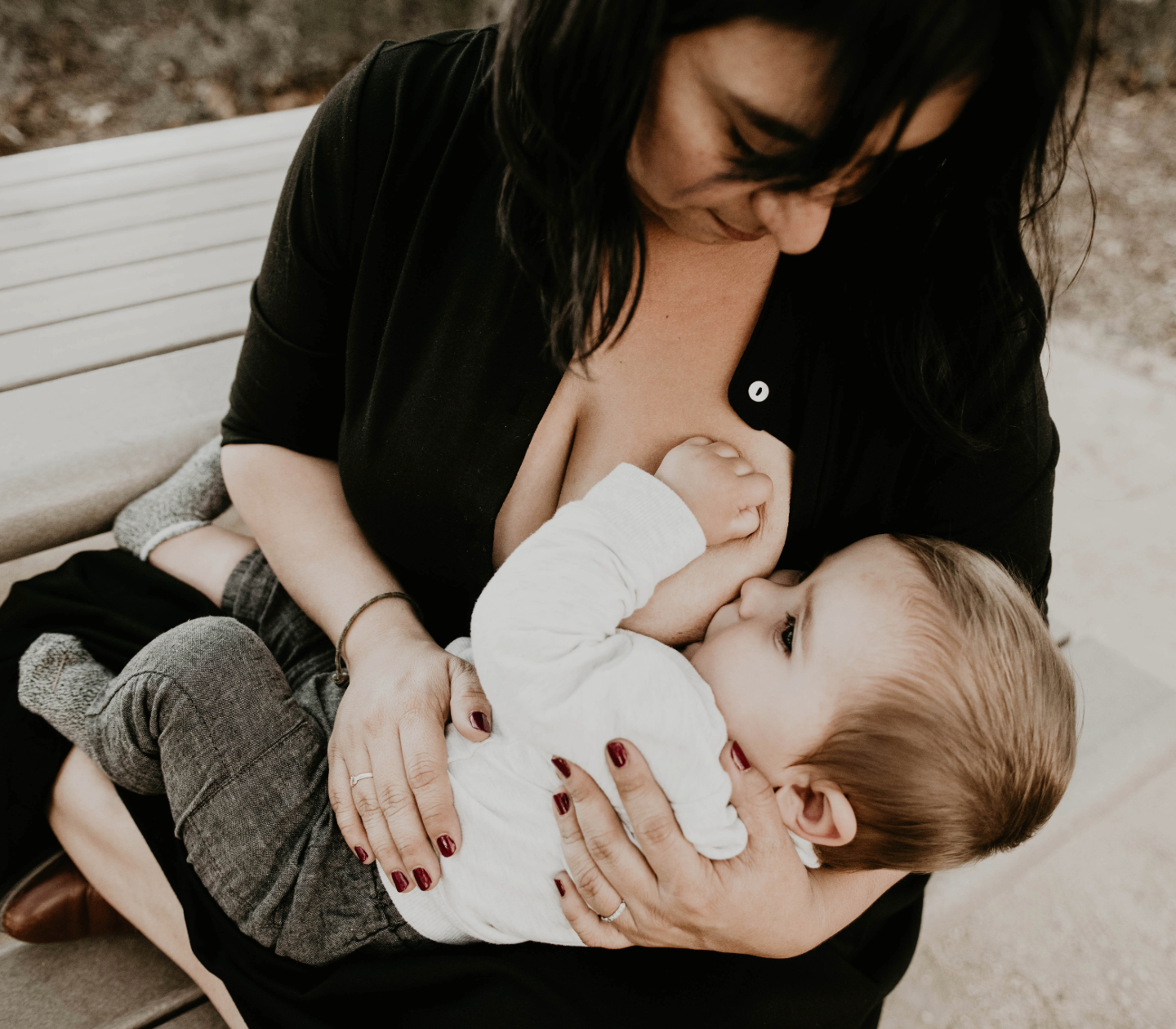 Hideko breast feeding infant.